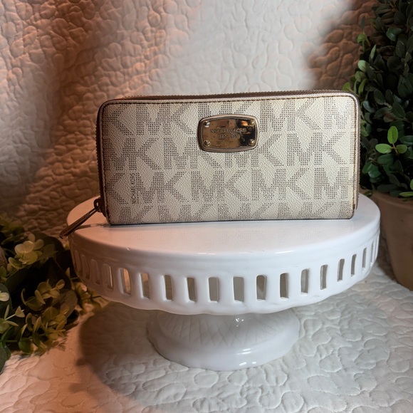Michael Kors Handbags - Michael Kors Beige Logo Zip Around Wallet with Gold Plate